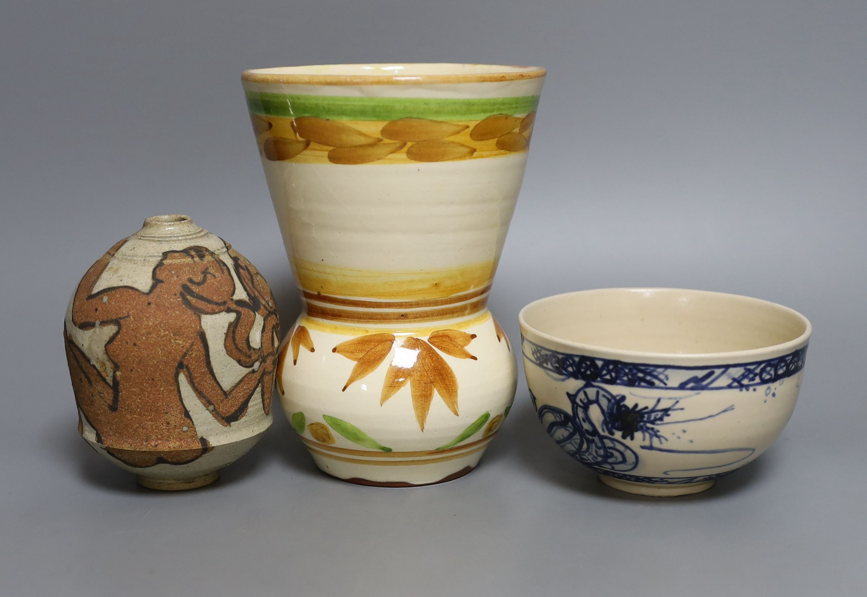 Three pieces of Yolande Beer pottery, to include a vase, ‘griffin’ bowl and a stoneware figural vase, tallest 17cm